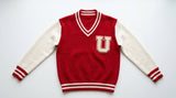 red and white varsity sweater with chenille letter patch
