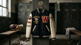 A high-end fashion editorial photo of a vintage varsity bomber jacket with custom football chenille patches and a large letter W, displayed inside an old school locker room setting.