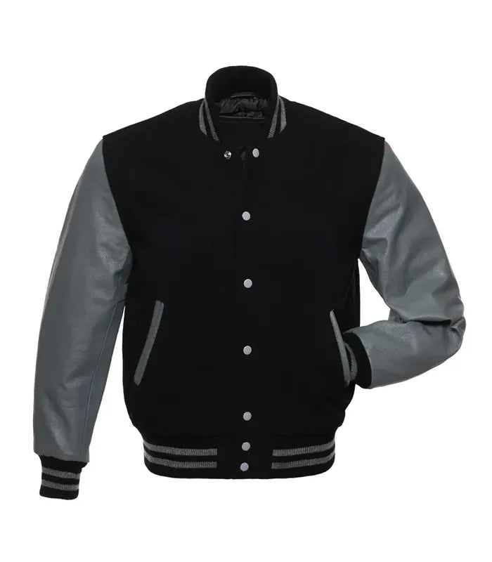 Black varsity jacket with gray leather sleeves, ribbed cuffs, and button front