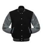 Black and gray varsity jacket with leather sleeves, button front, and striped cuffs