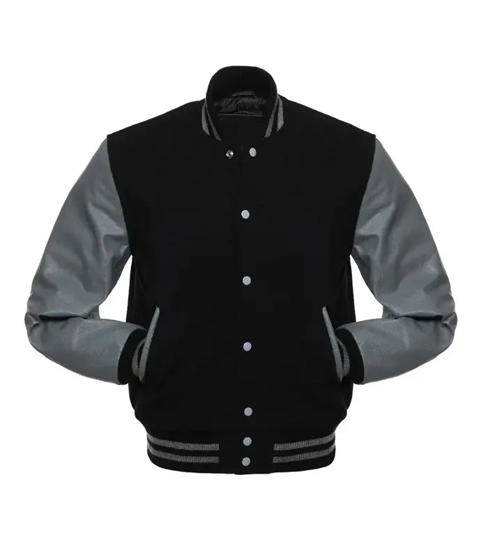 Black and gray varsity jacket with leather sleeves, button front, and striped cuffs