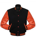Black and orange varsity jacket with leather sleeves, snap buttons, and striped trim