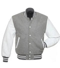 Grey and white varsity jacket front view with wool body, leather sleeves, and classic striped ribbed trims.