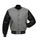 Gray wool varsity jacket with black leather sleeves, ribbed collar, and striped cuffs