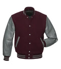 Maroon varsity jacket with gray leather sleeves, button front, and striped cuffs for custom team wear