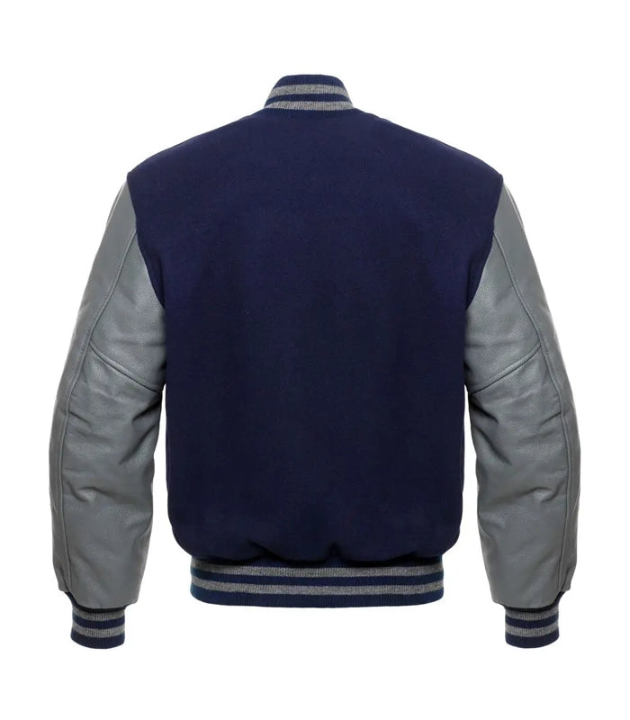 Navy blue varsity jacket with gray leather sleeves and striped cuffs, back view