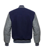 Navy blue varsity jacket with gray leather sleeves and striped cuffs, back view