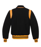 Back view of a black letterman jacket featuring a classic collar, contrasting gold leather shoulder details, and a yellow striped athletic hem.