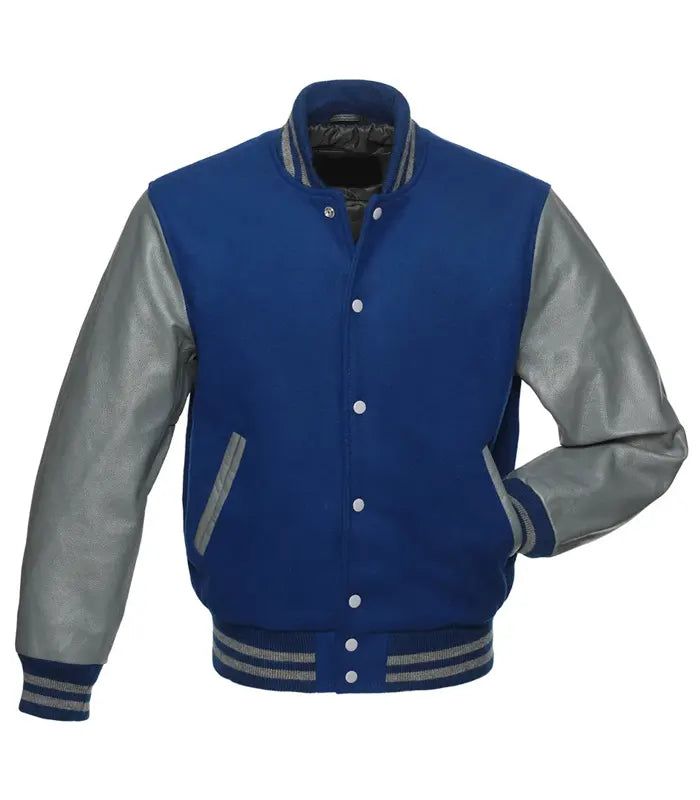 Royal blue varsity jacket with gray leather sleeves, striped cuffs, and front pockets