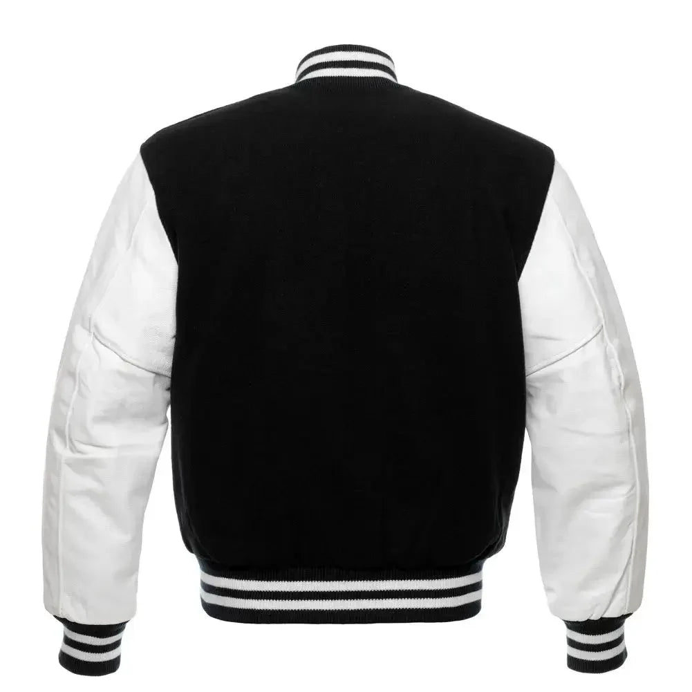 Black varsity baseball jacket back view with contrast white sleeves and striped waistband in classic letterman style.