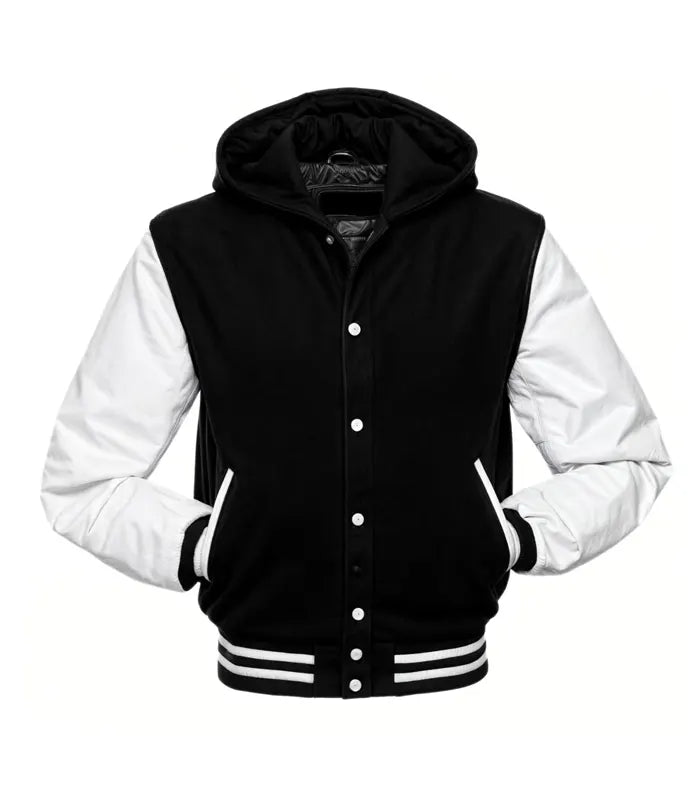 Front view of a black hooded varsity jacket with white leather sleeves, snap-button closure, and striped rib-knit waist and cuffs.