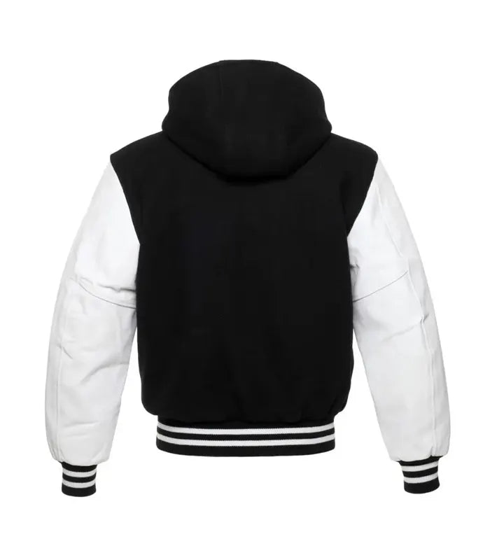 Back view of a black wool-body hooded letterman jacket with contrasting white sleeves and a striped athletic hem.